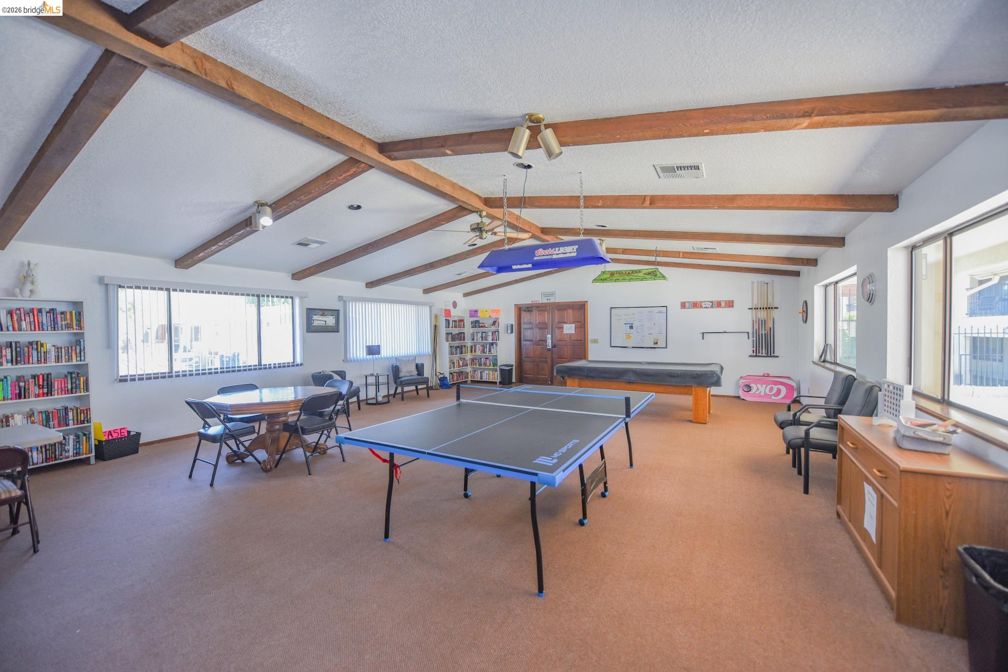 18717 Mill Villa Road, Unit 235 Jamestown, CA 95327 - Photo 21 of 24 Playroom featuring carpet flooring and a textured ceiling