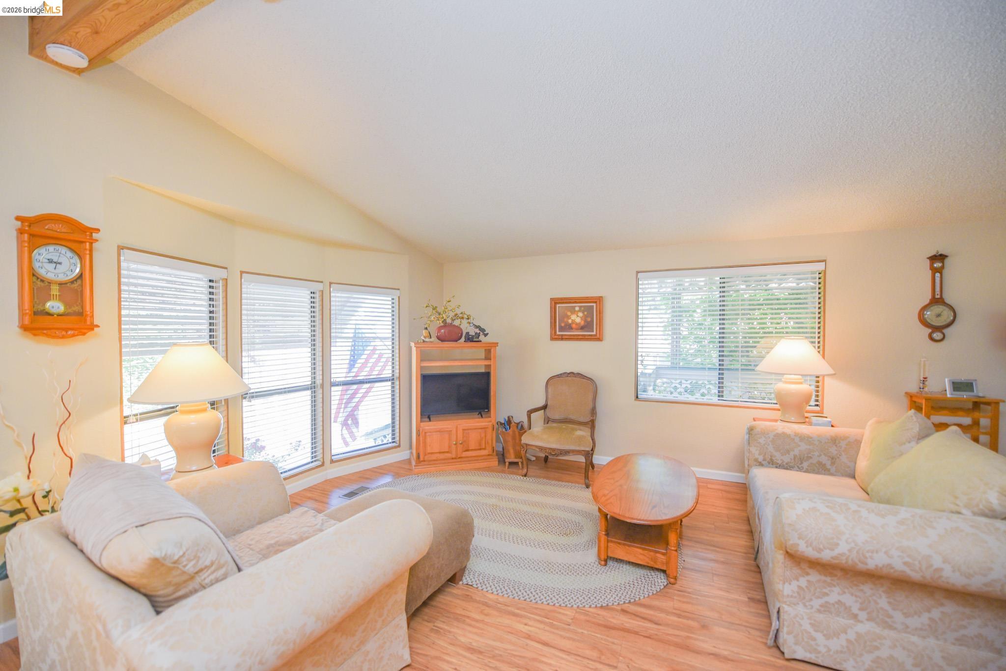 18717 Mill Villa Road, Unit 235 Jamestown, CA 95327 - Photo 9 of 24 Living room featuring wood finished floors