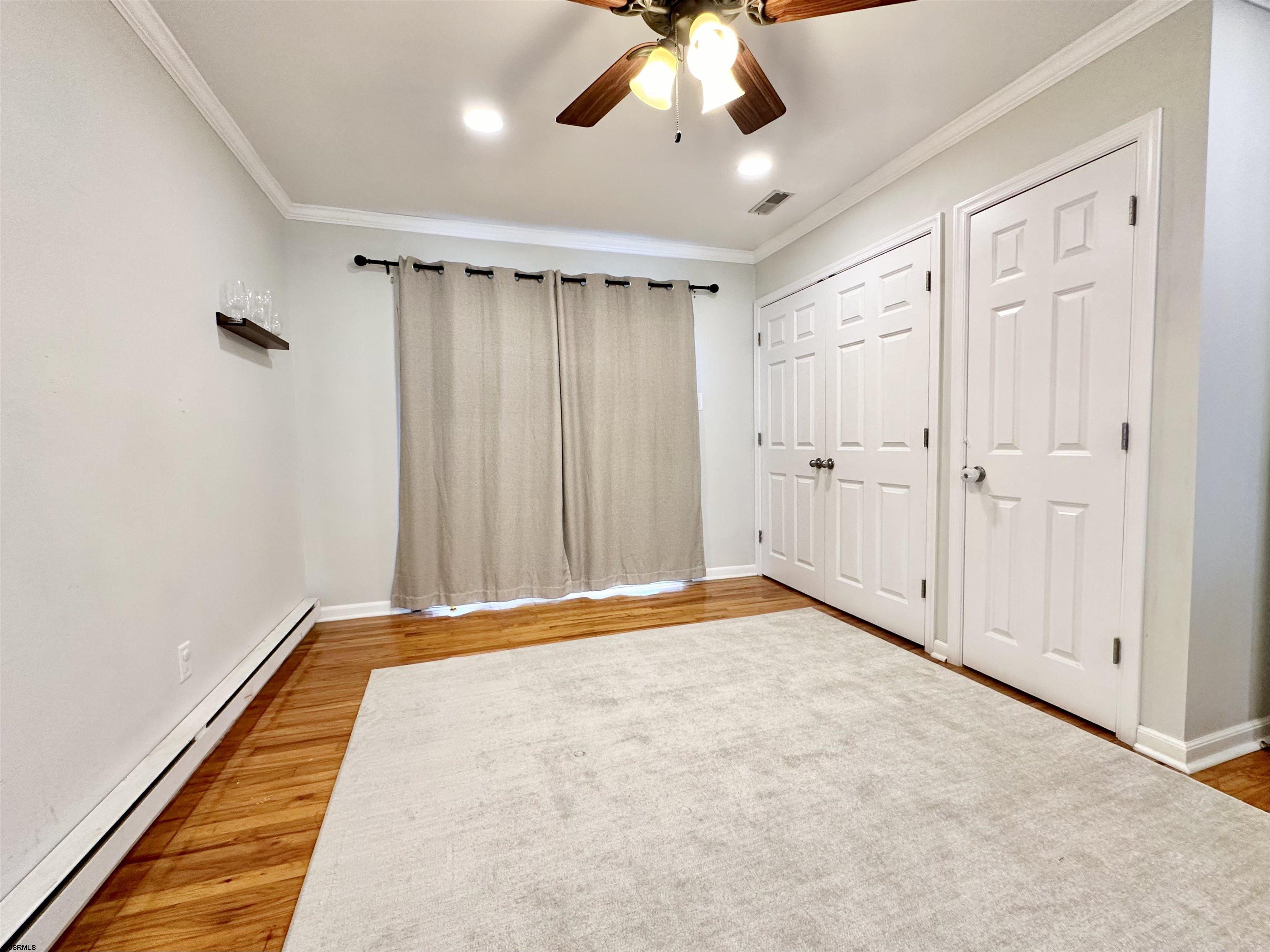 12 Explorer Road Brigantine, NJ 08203 - Photo 18 of 44 a view of an empty room with a window