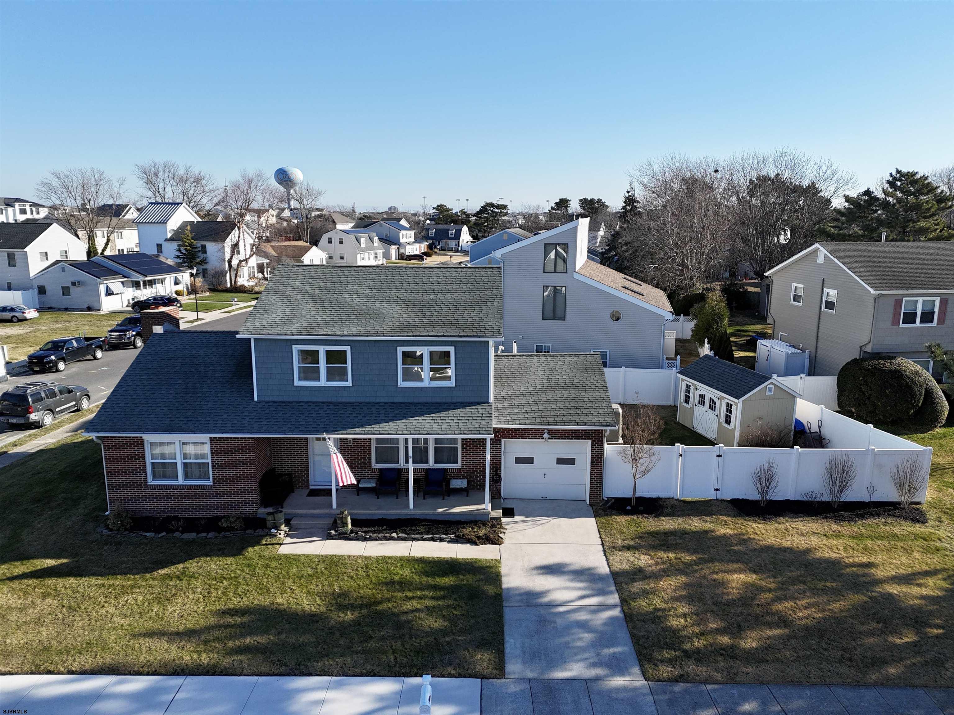 12 Explorer Road Brigantine, NJ 08203 - Photo 29 of 44 a view of a house with swimming pool and sitting area