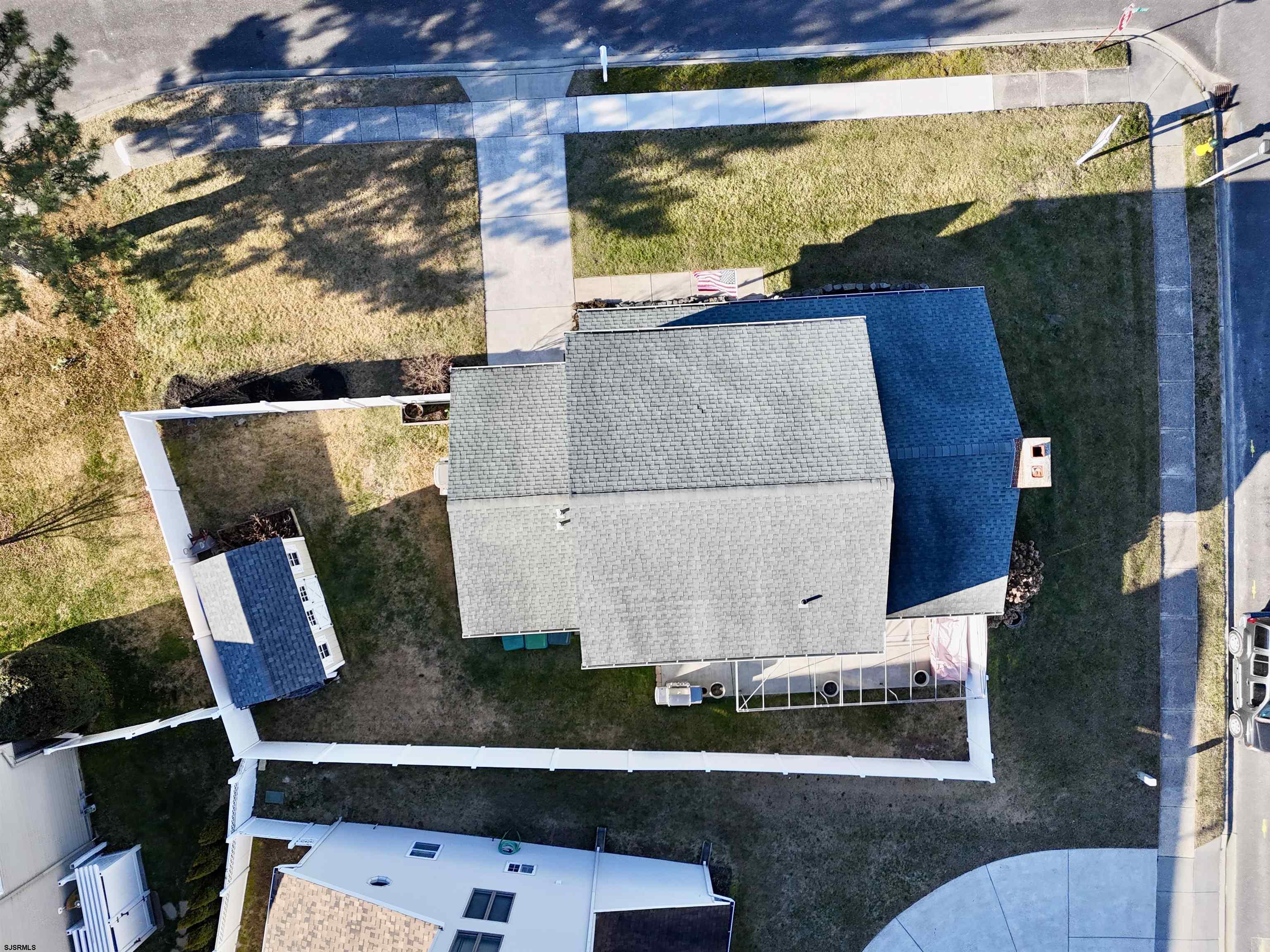 12 Explorer Road Brigantine, NJ 08203 - Photo 31 of 44 an aerial view of residential house with outdoor space and swimming pool