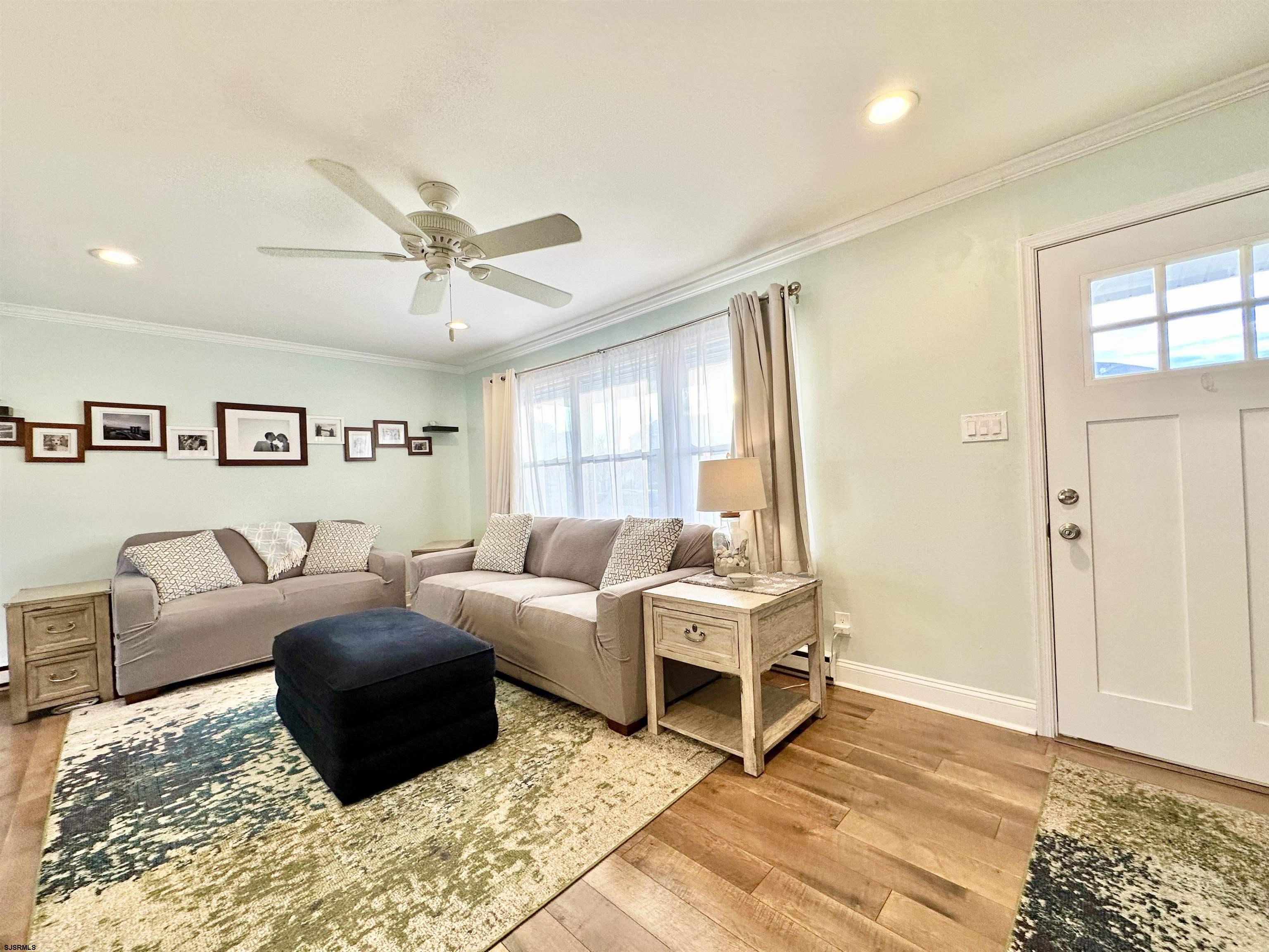 12 Explorer Road Brigantine, NJ 08203 - Photo 4 of 44 a living room with furniture and a window