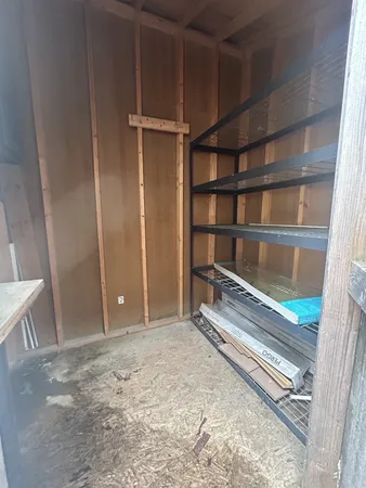 a view of an empty walk in closet