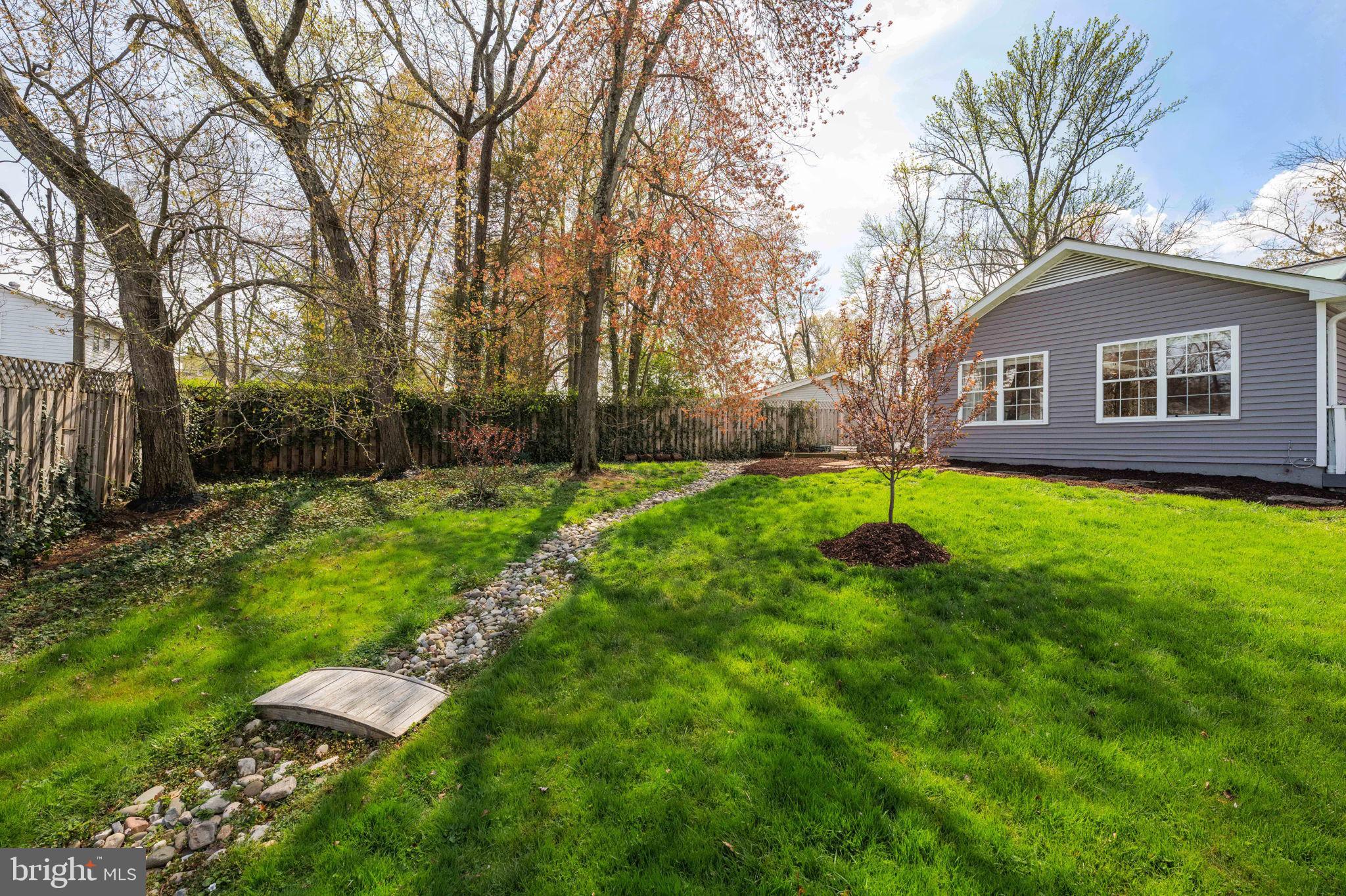 8635 Old Mt Vernon Road Alexandria, VA 22309 - Photo 39 of 47 Serene backyard oasis with lush greenery.