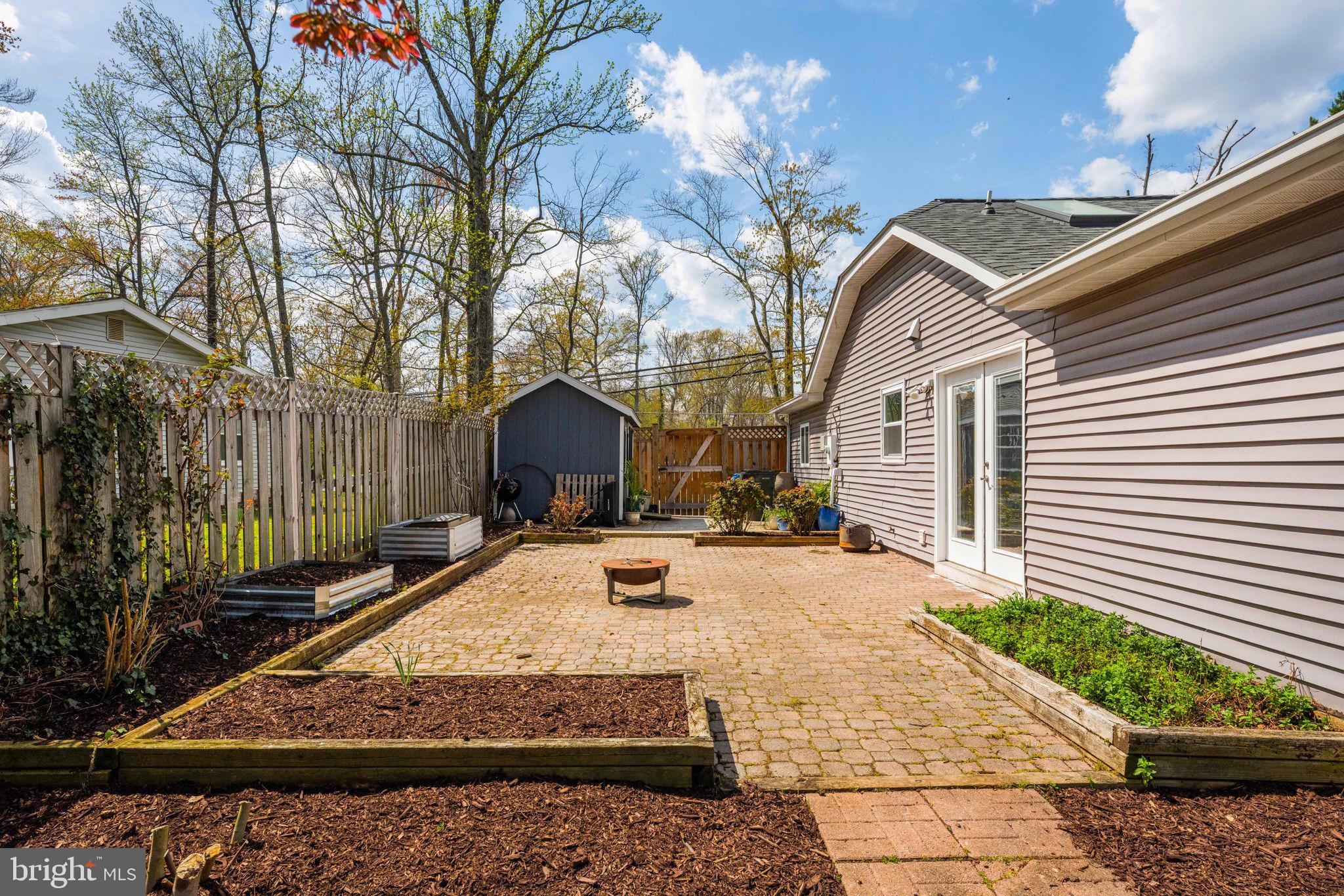 8635 Old Mt Vernon Road Alexandria, VA 22309 - Photo 43 of 47 Charming patio retreat in nature's embrace.