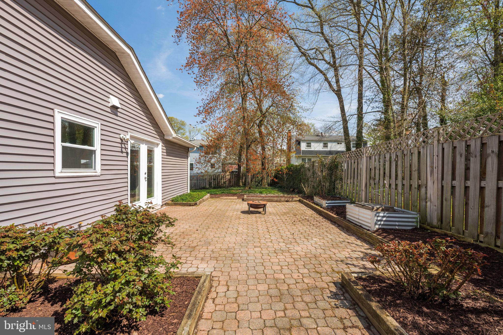 8635 Old Mt Vernon Road Alexandria, VA 22309 - Photo 45 of 47 Charming patio in a serene backyard.
