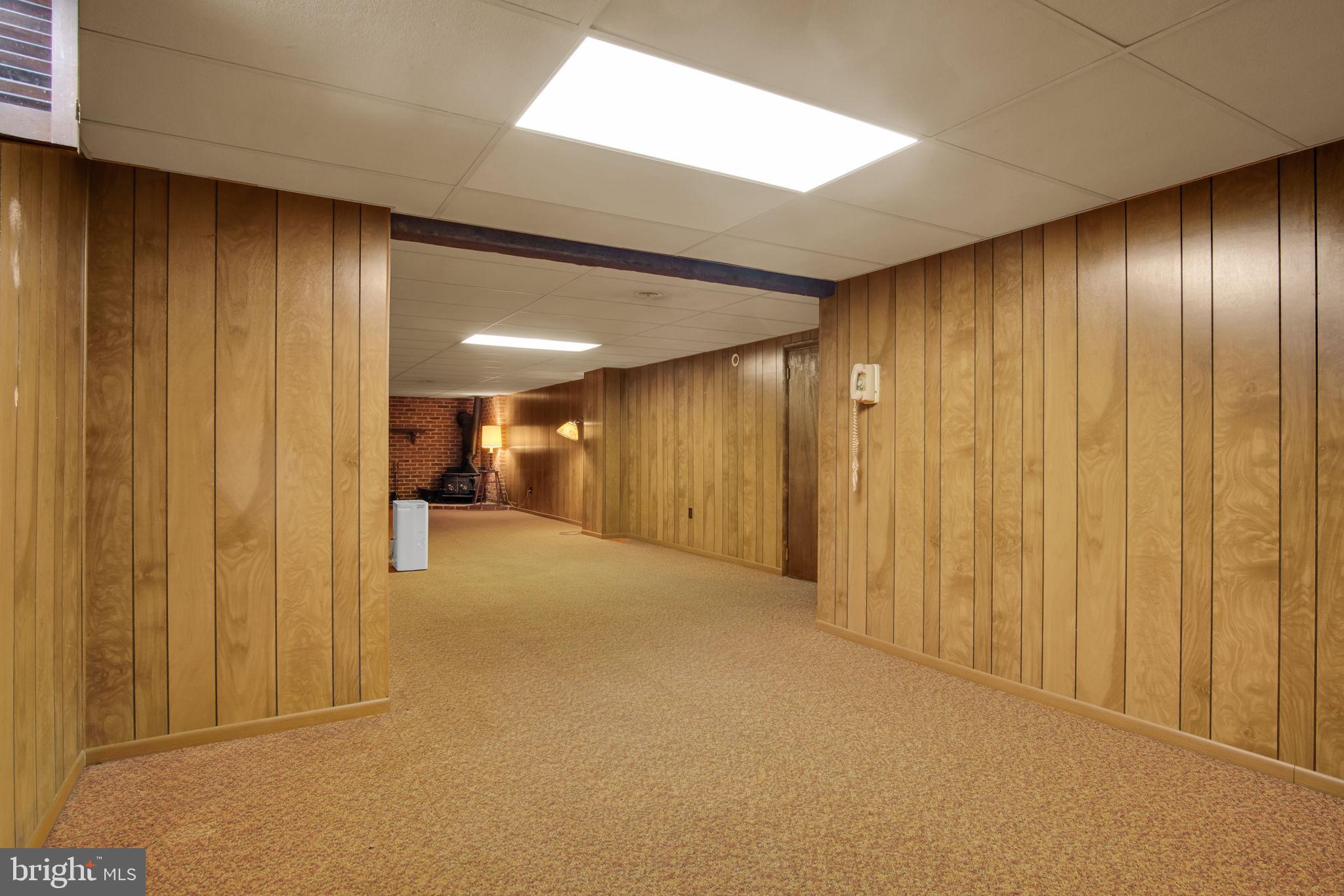 2382 Stoverstown Road Spring Grove, PA 17362 - Photo 14 of 33 Spacious basement with warm wood tones.