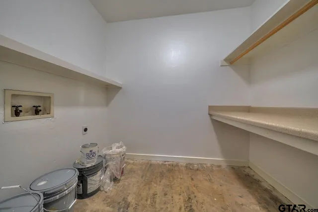 a house with trees in the background