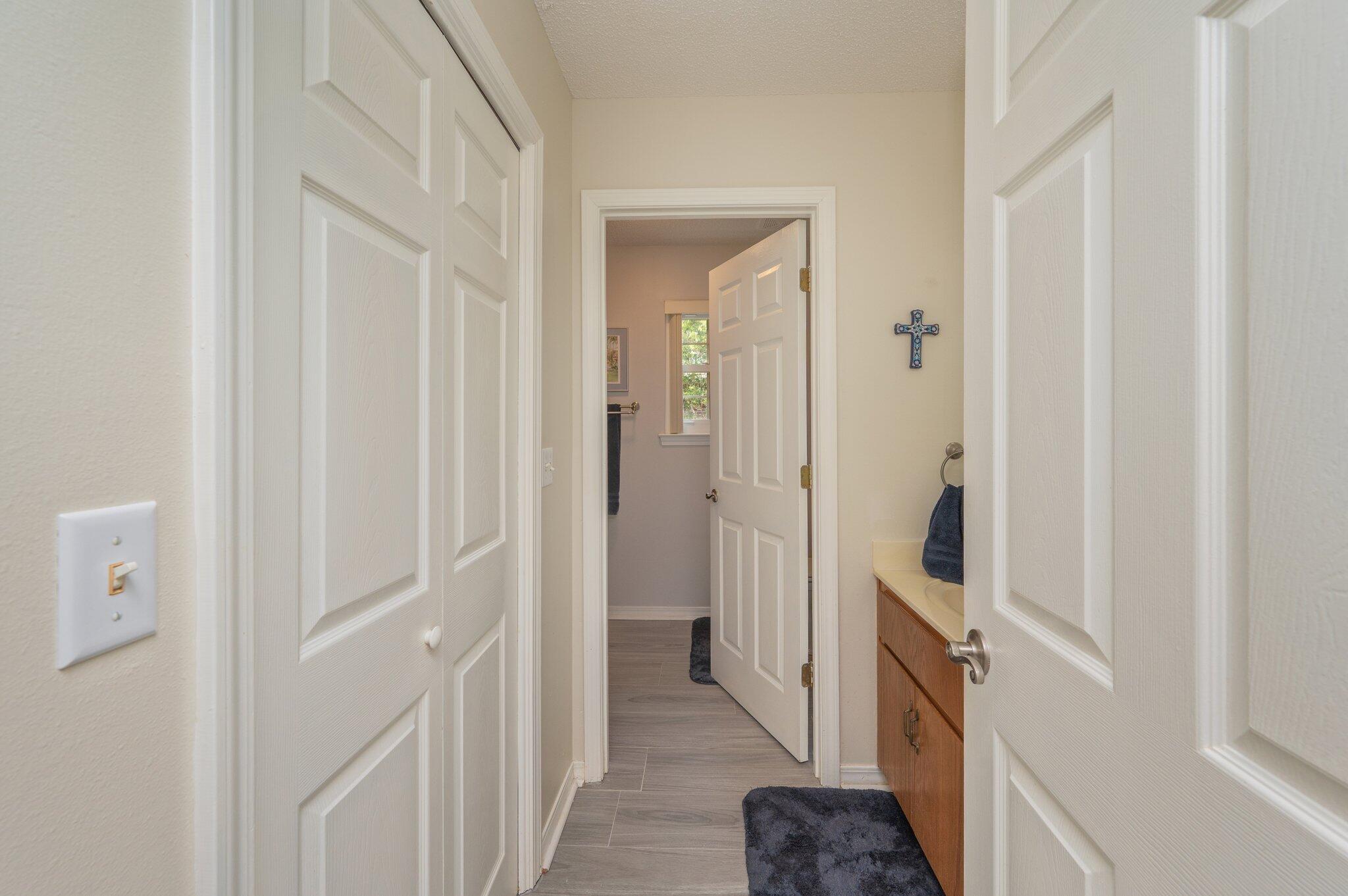 642 Alysheba Drive Crestview, FL 32539 - Photo 15 of 32 a view of a bathroom from the hallway