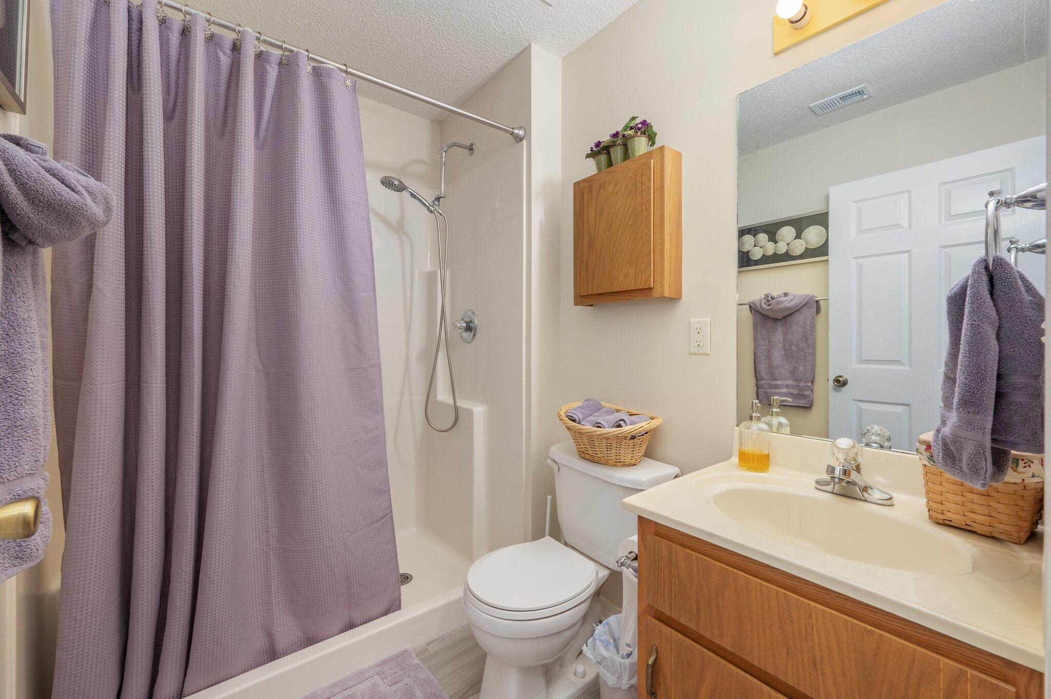 642 Alysheba Drive Crestview, FL 32539 - Photo 20 of 32 a bathroom with a sink toilet and shower