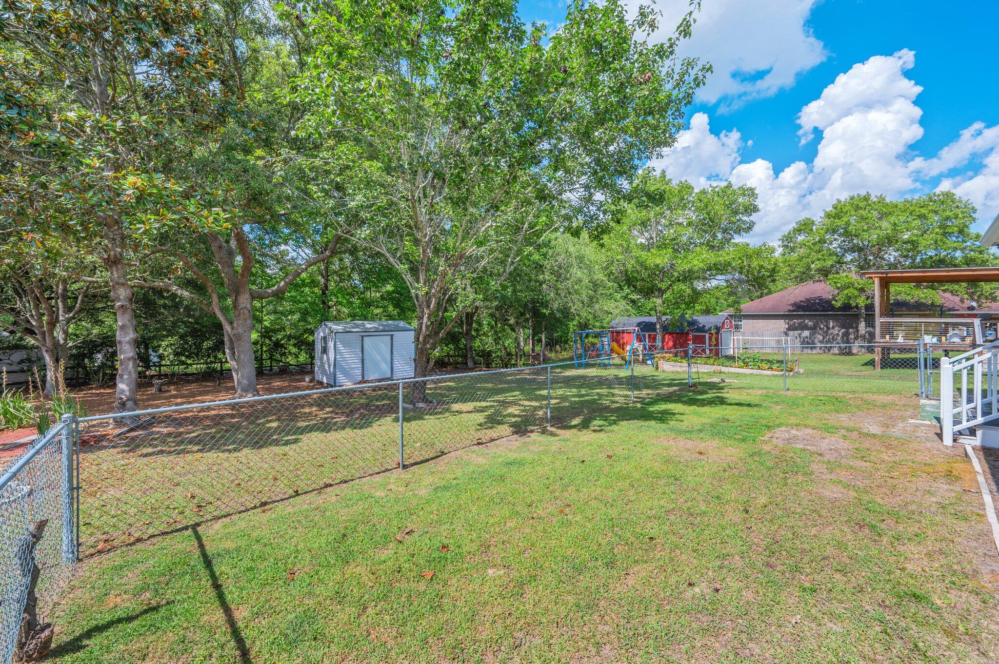 642 Alysheba Drive Crestview, FL 32539 - Photo 26 of 32 a childrens park with lots of trees
