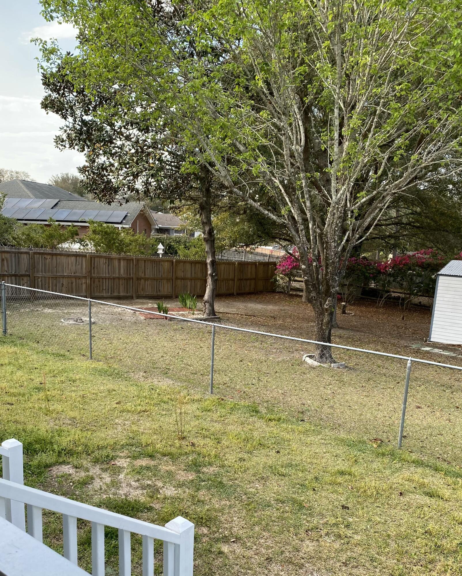 642 Alysheba Drive Crestview, FL 32539 - Photo 32 of 32 a view of a playground with a tree
