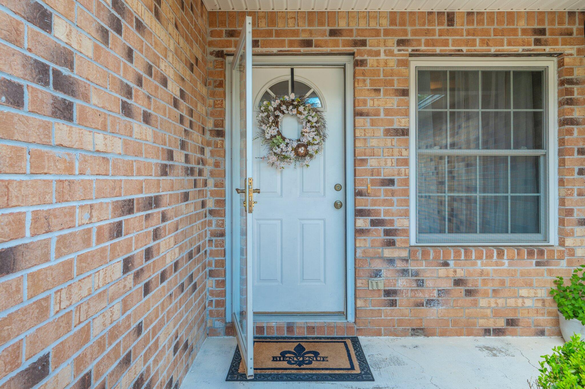 642 Alysheba Drive Crestview, FL 32539 - Photo 4 of 32 a view of a door and a window