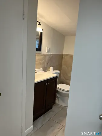 a hallway with a kitchen