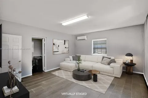 an aerial view of a multi story building with an outdoor space