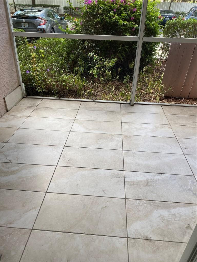 6820 West Sample Road, Unit 6820 Coral Springs, FL 33067 - Photo 1 of 13 a view of a wooden fence