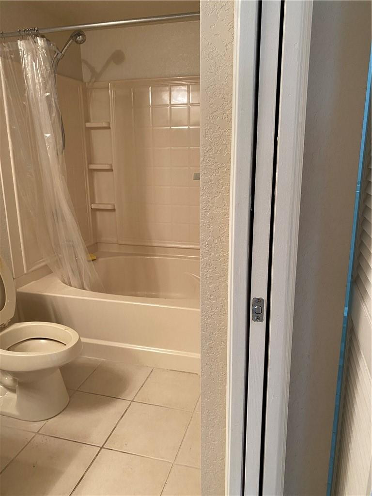6820 West Sample Road, Unit 6820 Coral Springs, FL 33067 - Photo 5 of 13 a bathroom with a toilet and a shower