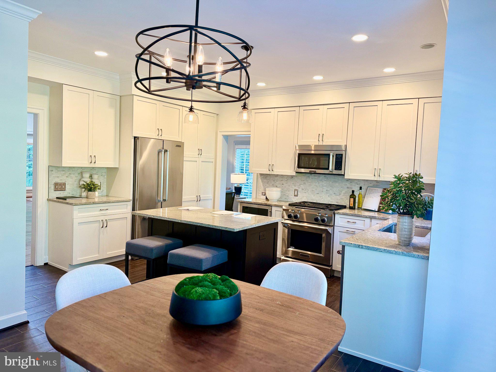 9733 Hidden Road Vienna, VA 22181 - Photo 11 of 39 Modern kitchen with elegant finishes.