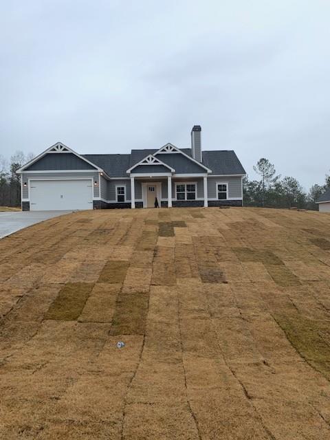 357 Hutcheson Pass Temple, GA 30179 - Photo 1 of 1 a front view of a house with a yard and mountain view in back