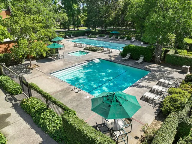 a view of a lake with a yard