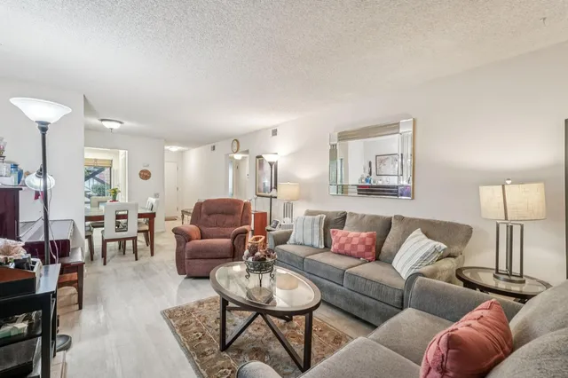 a living room with furniture and a couch