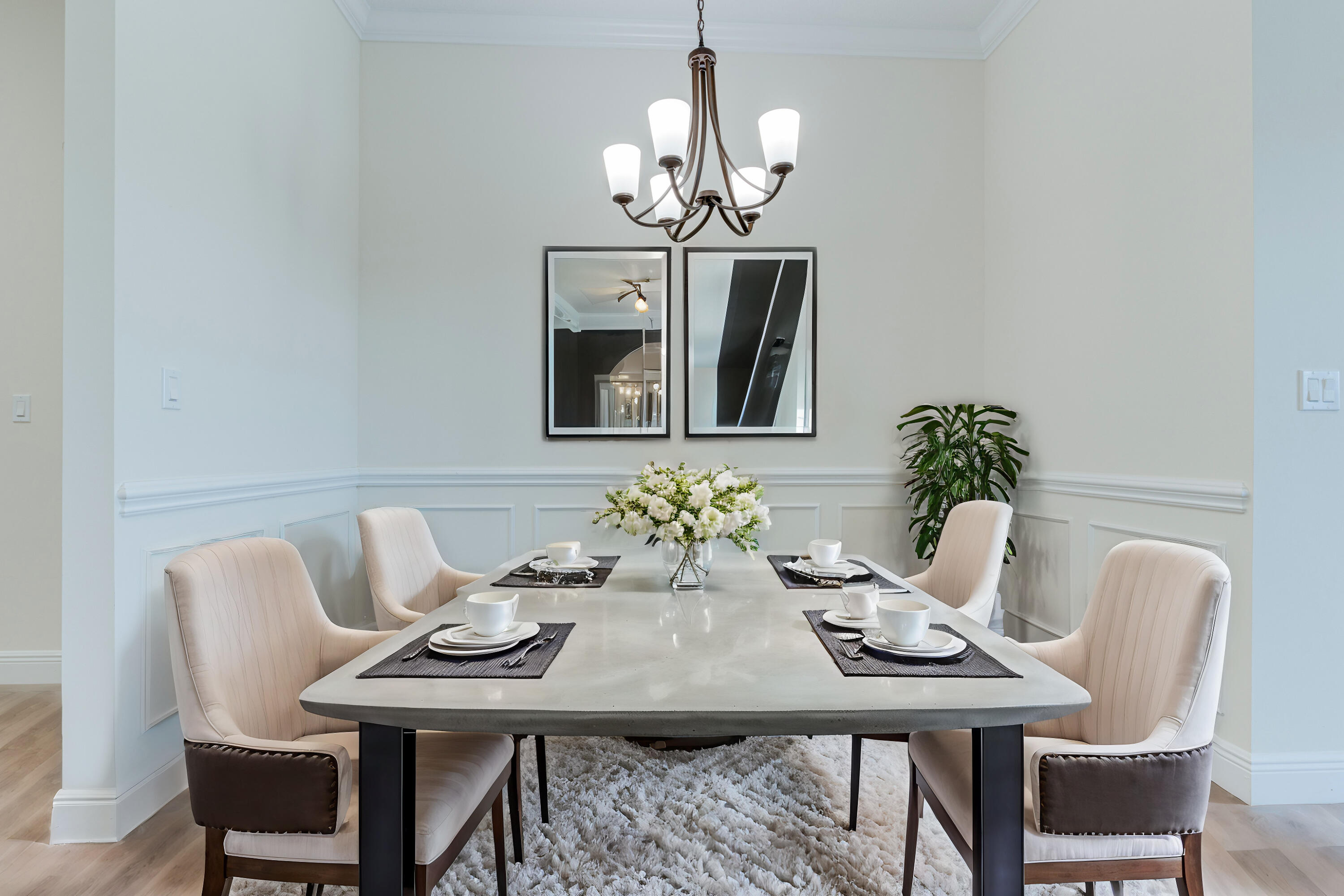 1805 Bridgepointe Circle, Unit 3 Vero Beach, FL 32967 - Photo 7 of 28 a view of a dining room with furniture and chandelier