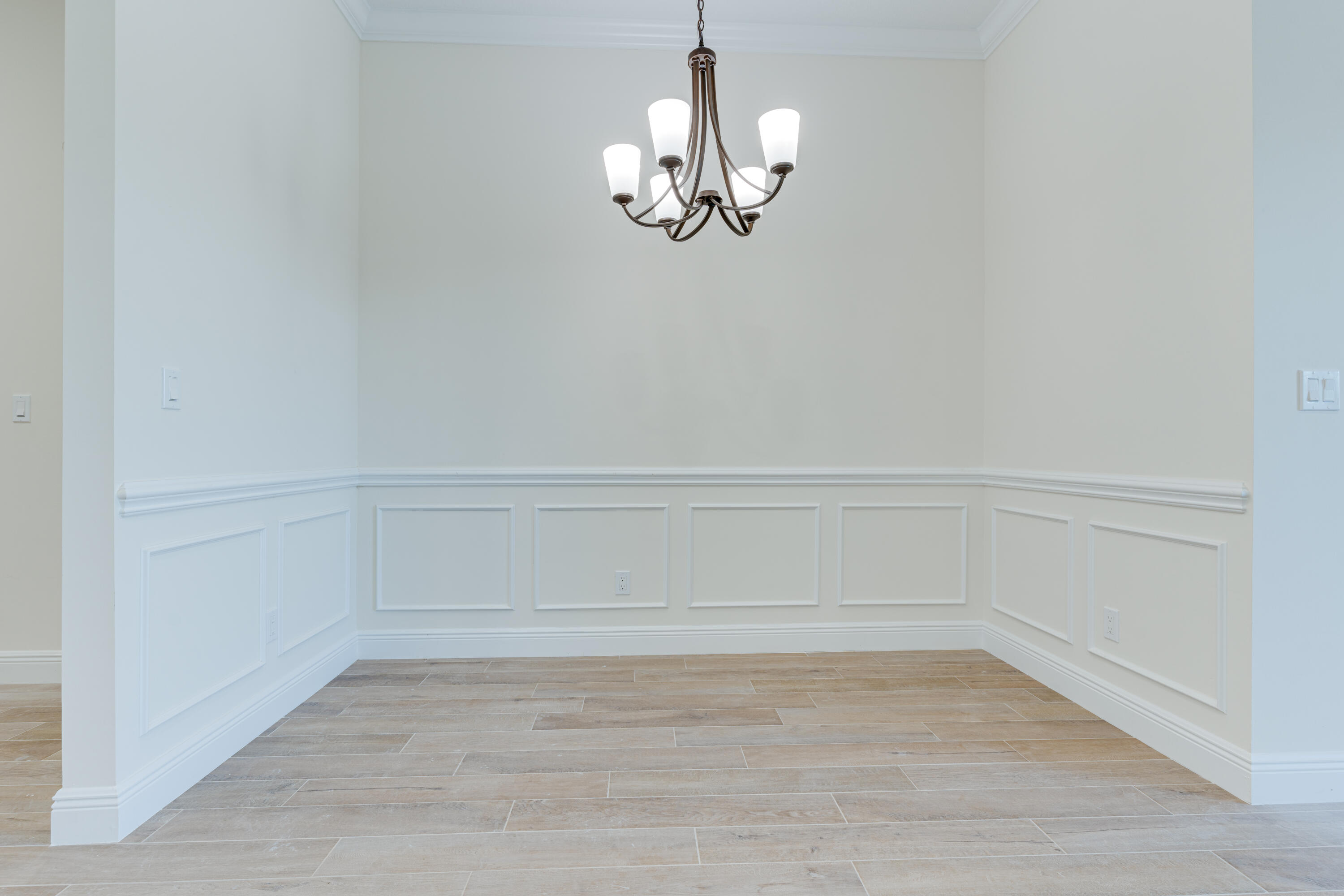 1805 Bridgepointe Circle, Unit 3 Vero Beach, FL 32967 - Photo 8 of 28 a view of a chandelier in big room