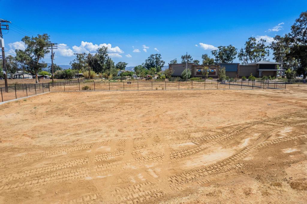 1703 Main Street Ramona, CA 92065 - Photo 18 of 24 a view of swimming pool with outdoor seating and yard in the back