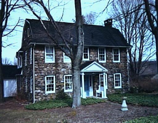 2 Codfish Hill Road Bethel, CT 06801 - Photo 1 of 1 a front view of a house with garden