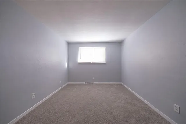 an empty room with a window