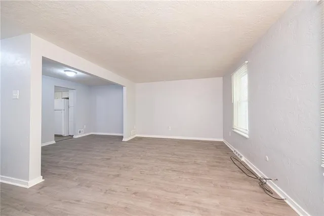 an empty room with windows