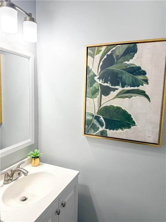 722 Mercer Street Pittsburgh, PA 15219 - Photo 5 of 41 a bathroom with a sink and a mirror