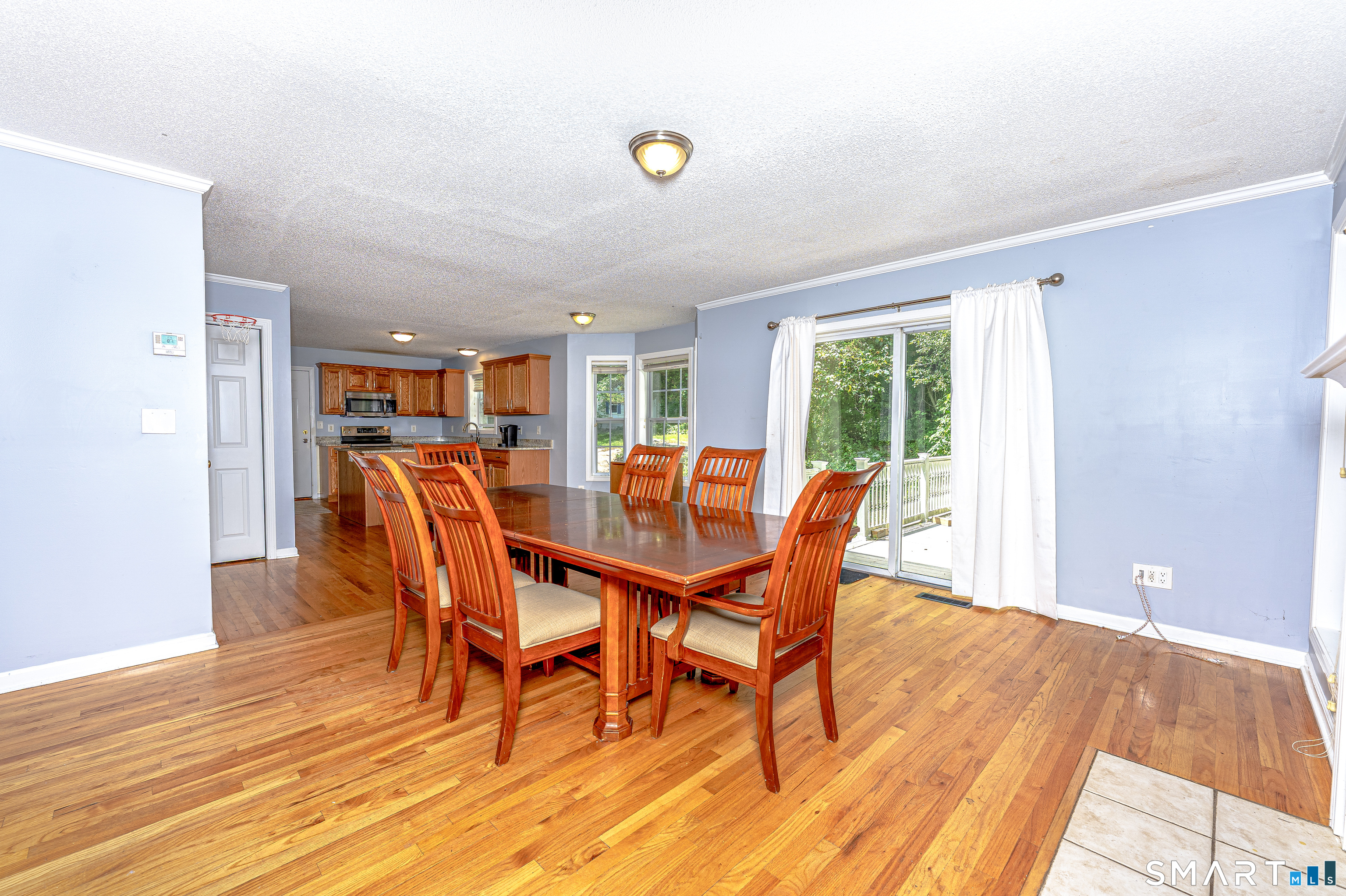 20 Gaylord Mountain Road Hamden, CT 06518 - Photo 17 of 37 a view of a dining room with furniture and wooden floor