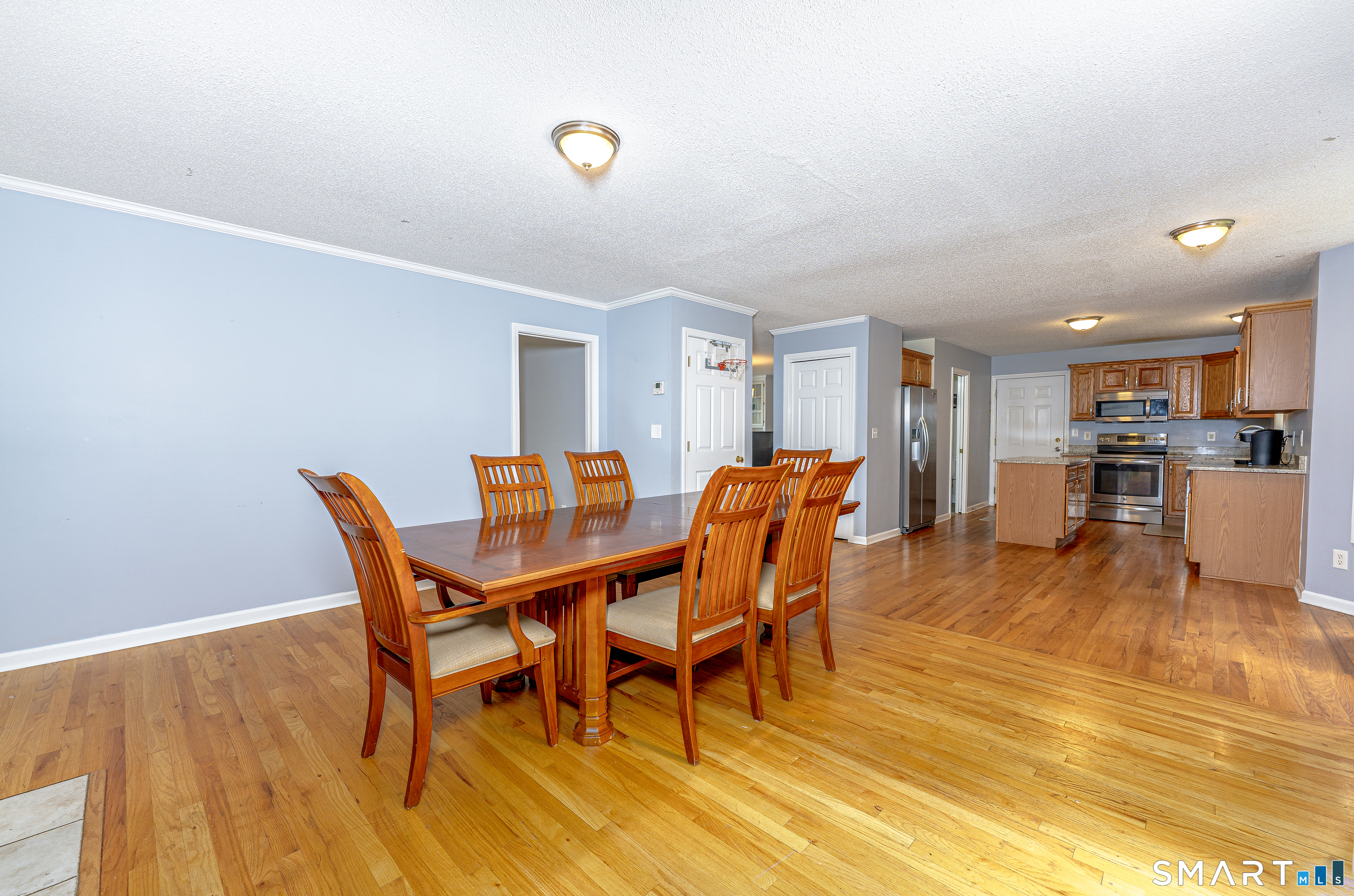 20 Gaylord Mountain Road Hamden, CT 06518 - Photo 18 of 37 a view of a dining room with furniture and wooden floor