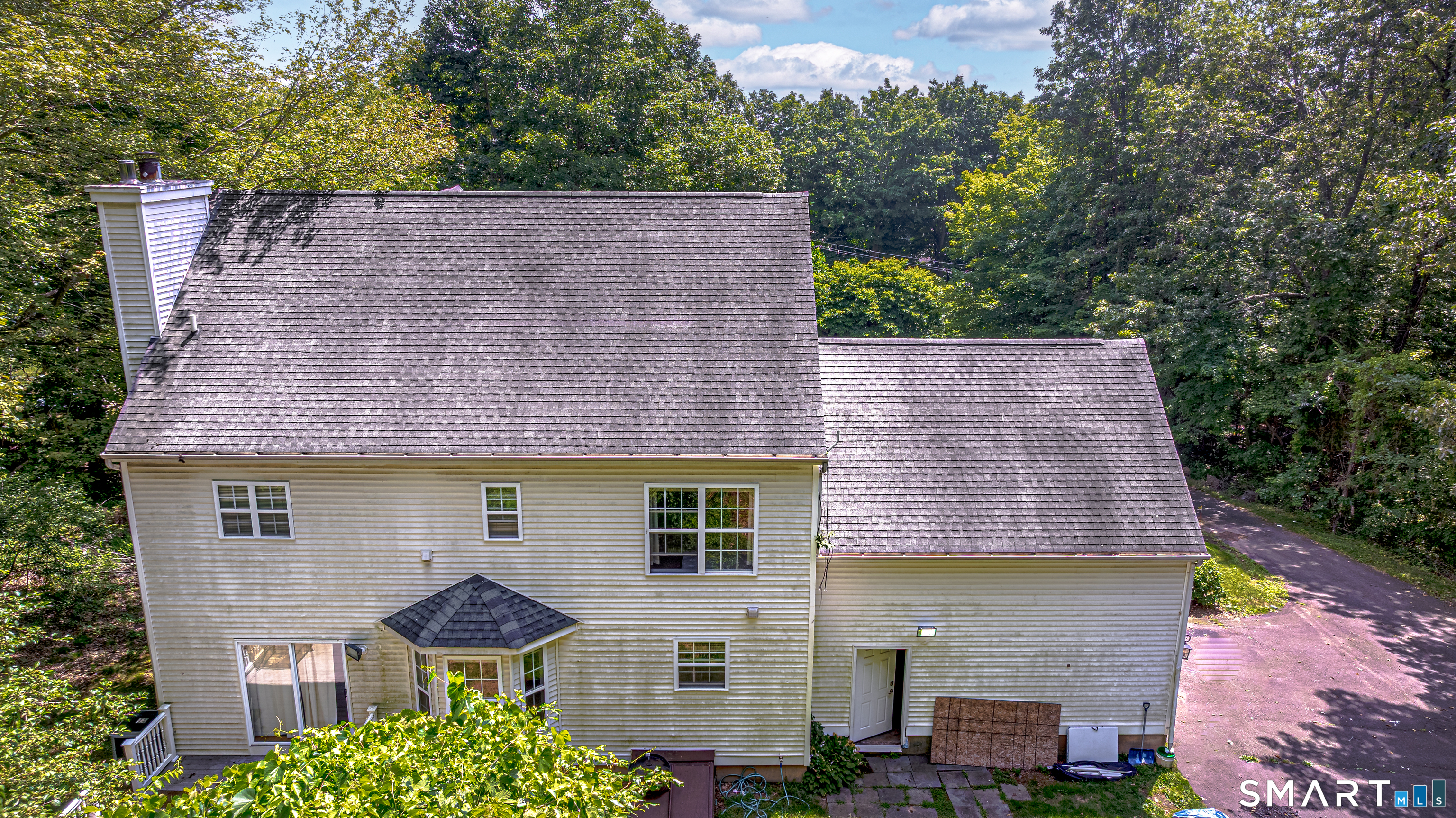 20 Gaylord Mountain Road Hamden, CT 06518 - Photo 6 of 37 aerial view of a house with a yard and potted plants
