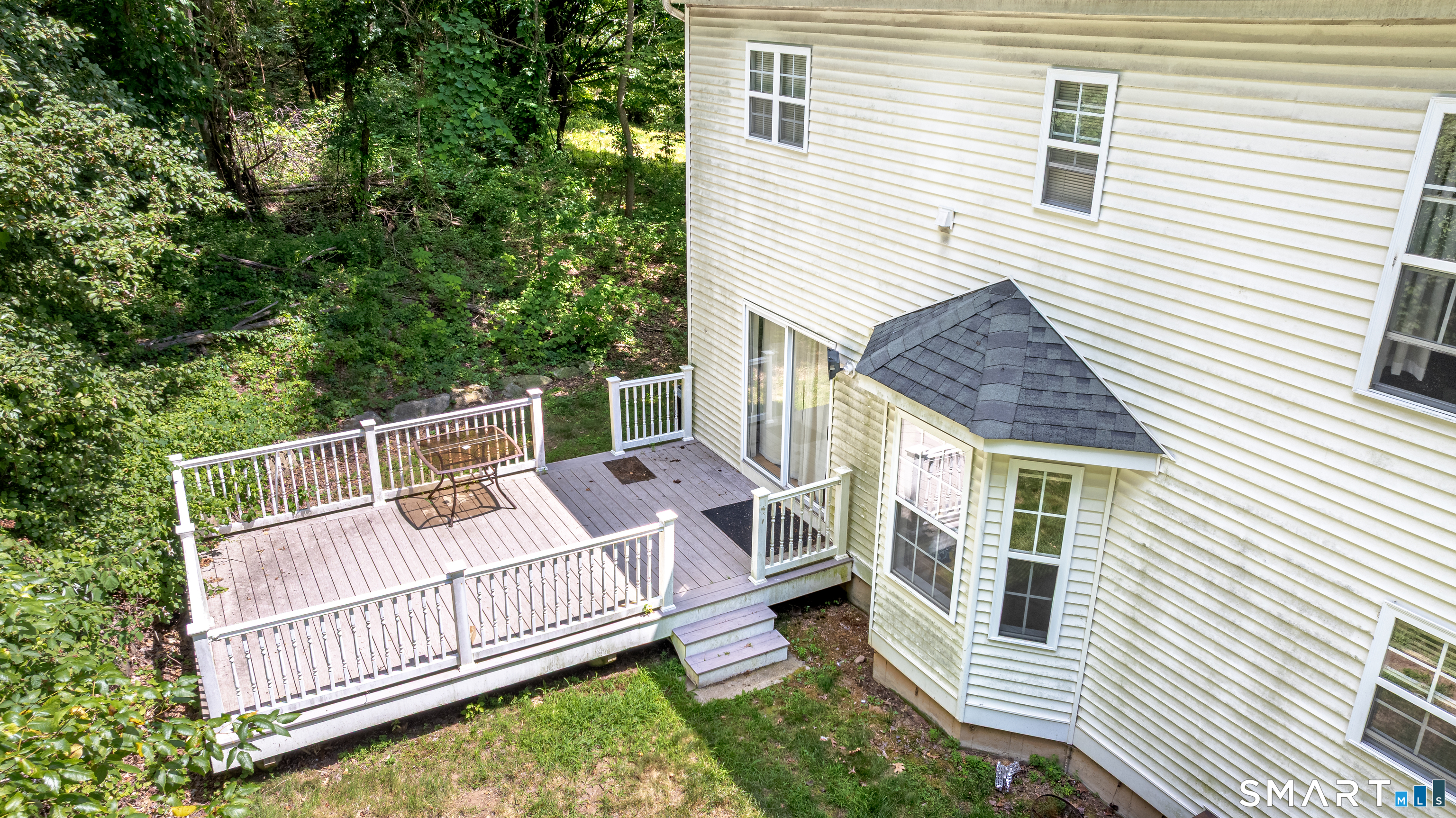 20 Gaylord Mountain Road Hamden, CT 06518 - Photo 7 of 37 a view of a deck with a chair