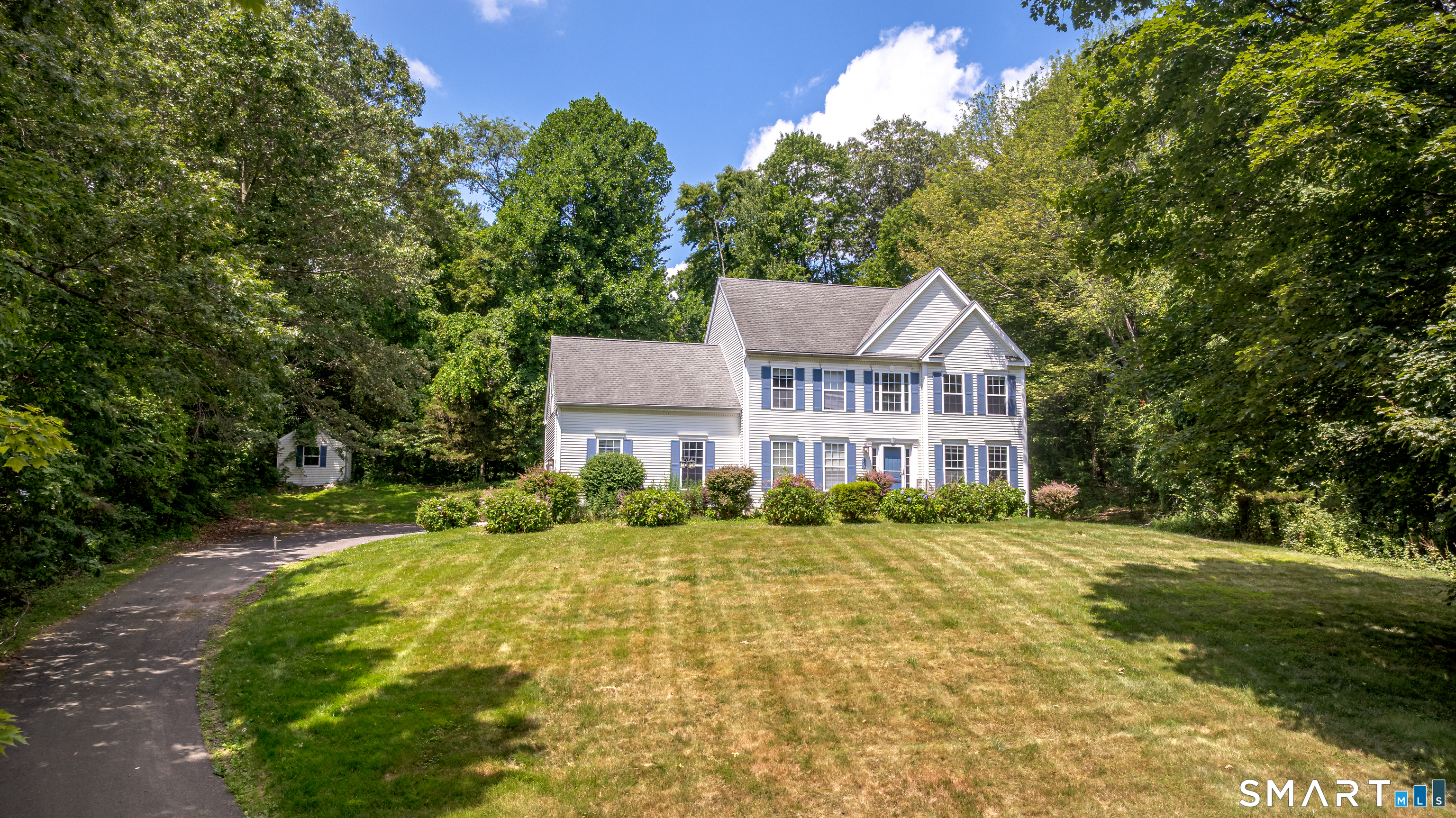 20 Gaylord Mountain Road Hamden, CT 06518 - Photo 10 of 37 a view of a house with a yard