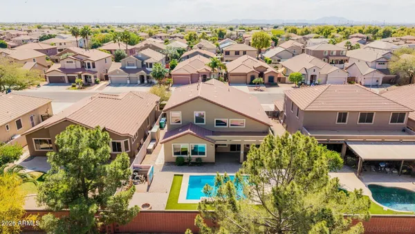 an aerial view of a house with a garden
