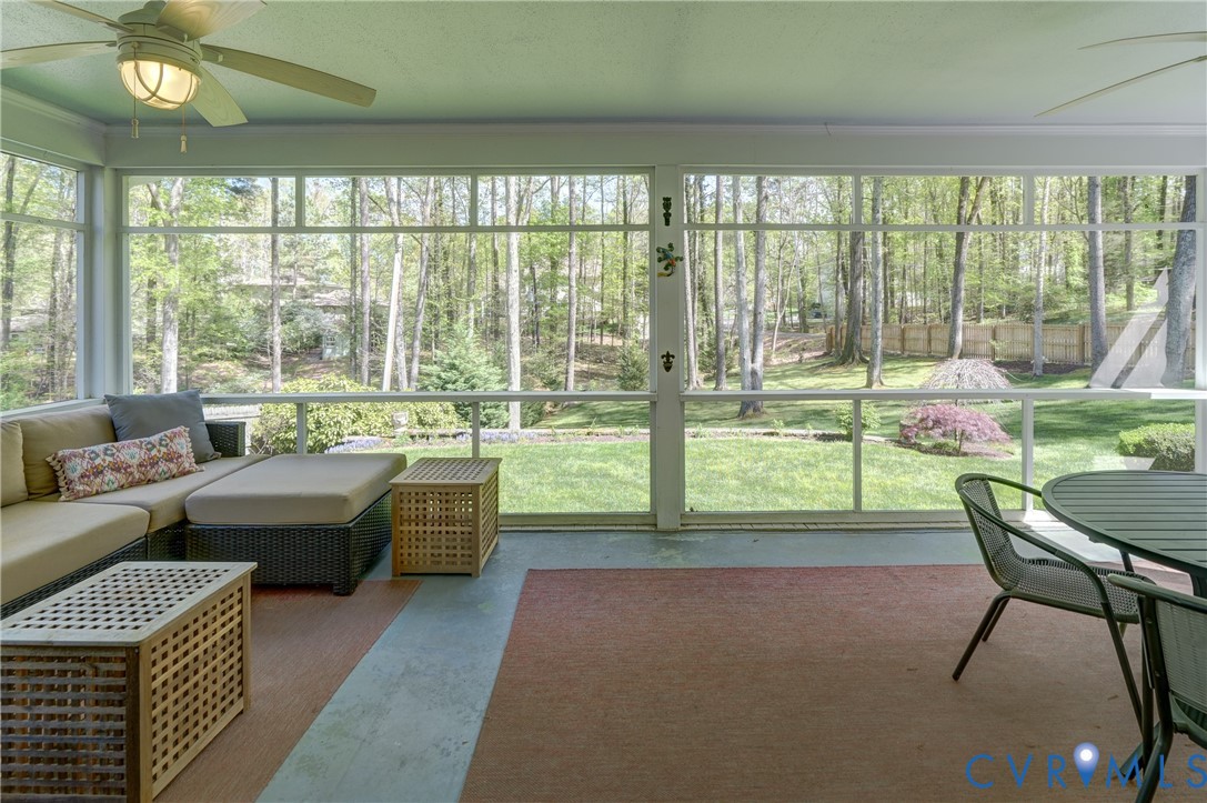 4287 Cheyenne Road Richmond, VA 23235 - Photo 16 of 60 a living room with furniture and a large window