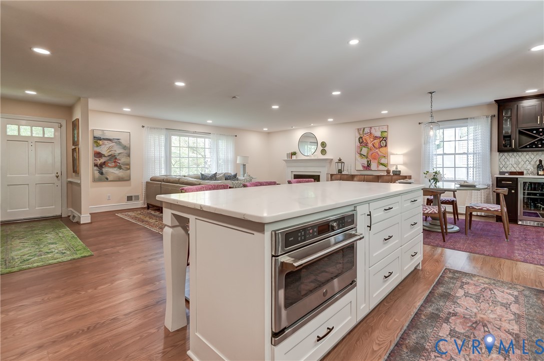 4287 Cheyenne Road Richmond, VA 23235 - Photo 31 of 60 a kitchen with a stove a sink and a refrigerator