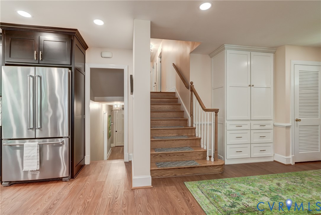 4287 Cheyenne Road Richmond, VA 23235 - Photo 38 of 60 a view of hallway with stairs and wooden floor