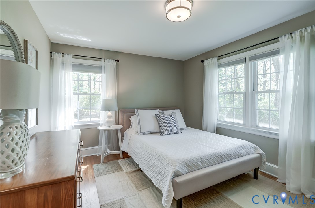 4287 Cheyenne Road Richmond, VA 23235 - Photo 52 of 60 a bedroom with a large bed and a window