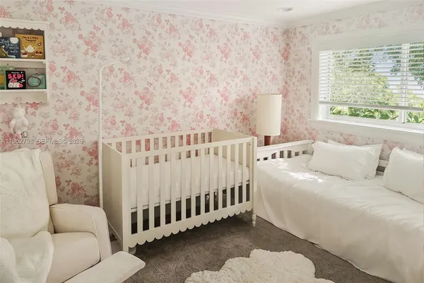 a bed room with a bed and a couch