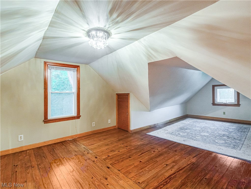 4349 Broadview Road Richfield, OH 44286 - Photo 19 of 20 Additional living space featuring vaulted ceiling and light hardwood floors