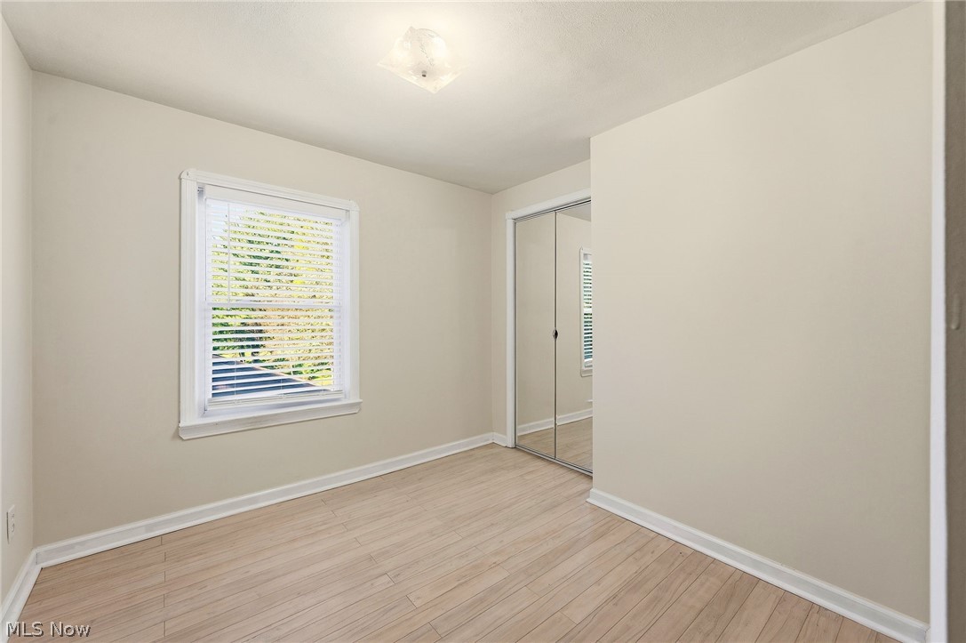 6832 Hillside Road Independence, OH 44131 - Photo 23 of 44 Second bedroom on second floor with mirrored closet