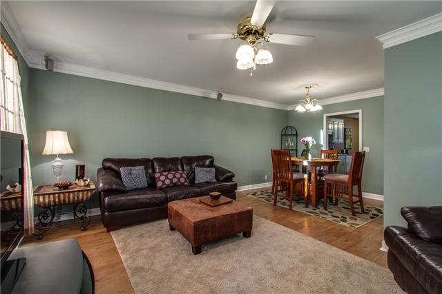 737 Gen George Patton Road, Unit 737 Nashville, TN 37221 - Photo 18 of 18 Unique Floor Plan with 2 Living Spaces. The Spacious Living and Dining Room is Pictured here with Smooth Ceiling, Crown Molding and Surround Sound Speakers