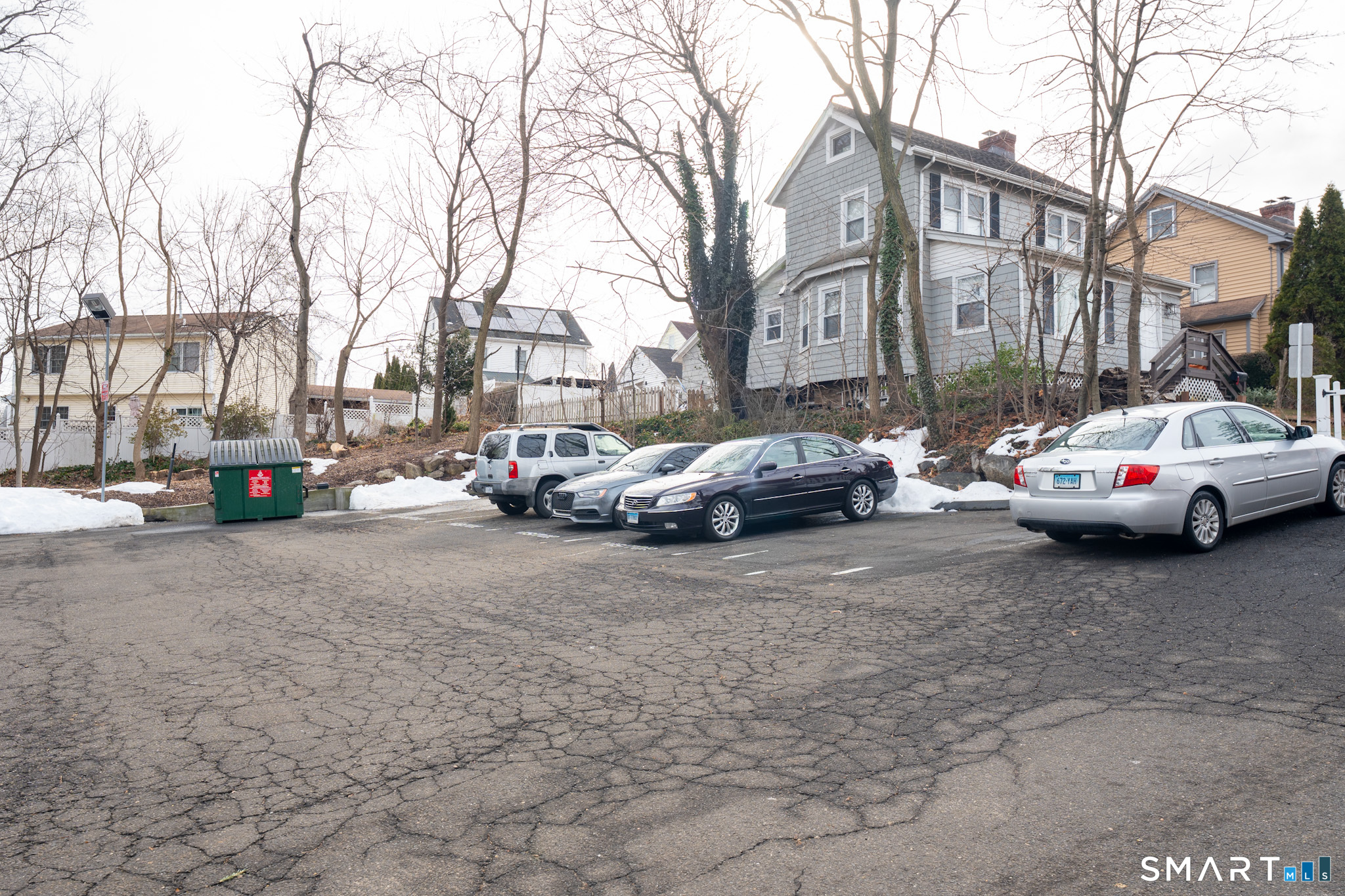 24 Home Court, Unit 4 Stamford, CT 06902 - Photo 15 of 18 a view of a cars parked on the side of a street