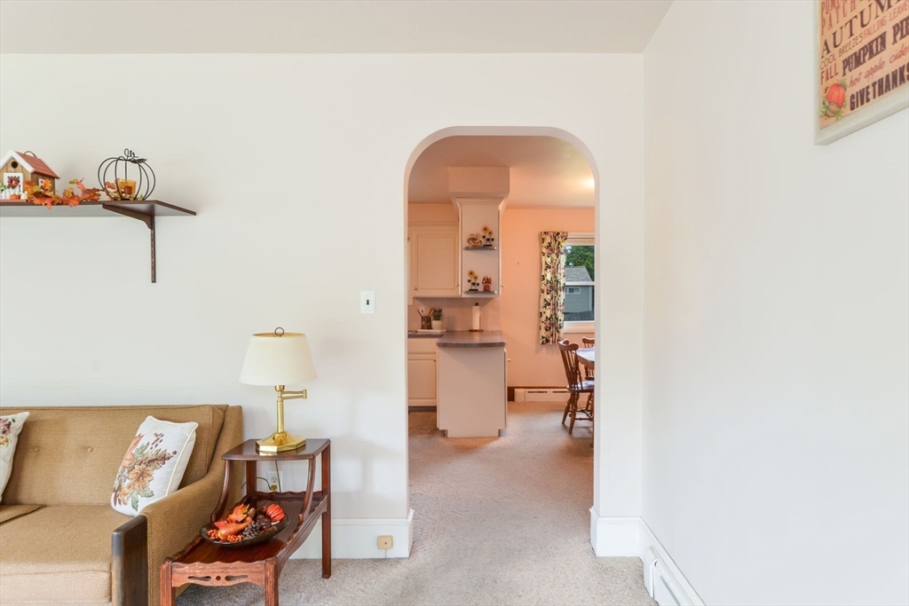 264 Lepes Road Somerset, MA 02726 - Photo 8 of 26 a view of a living room and bathroom