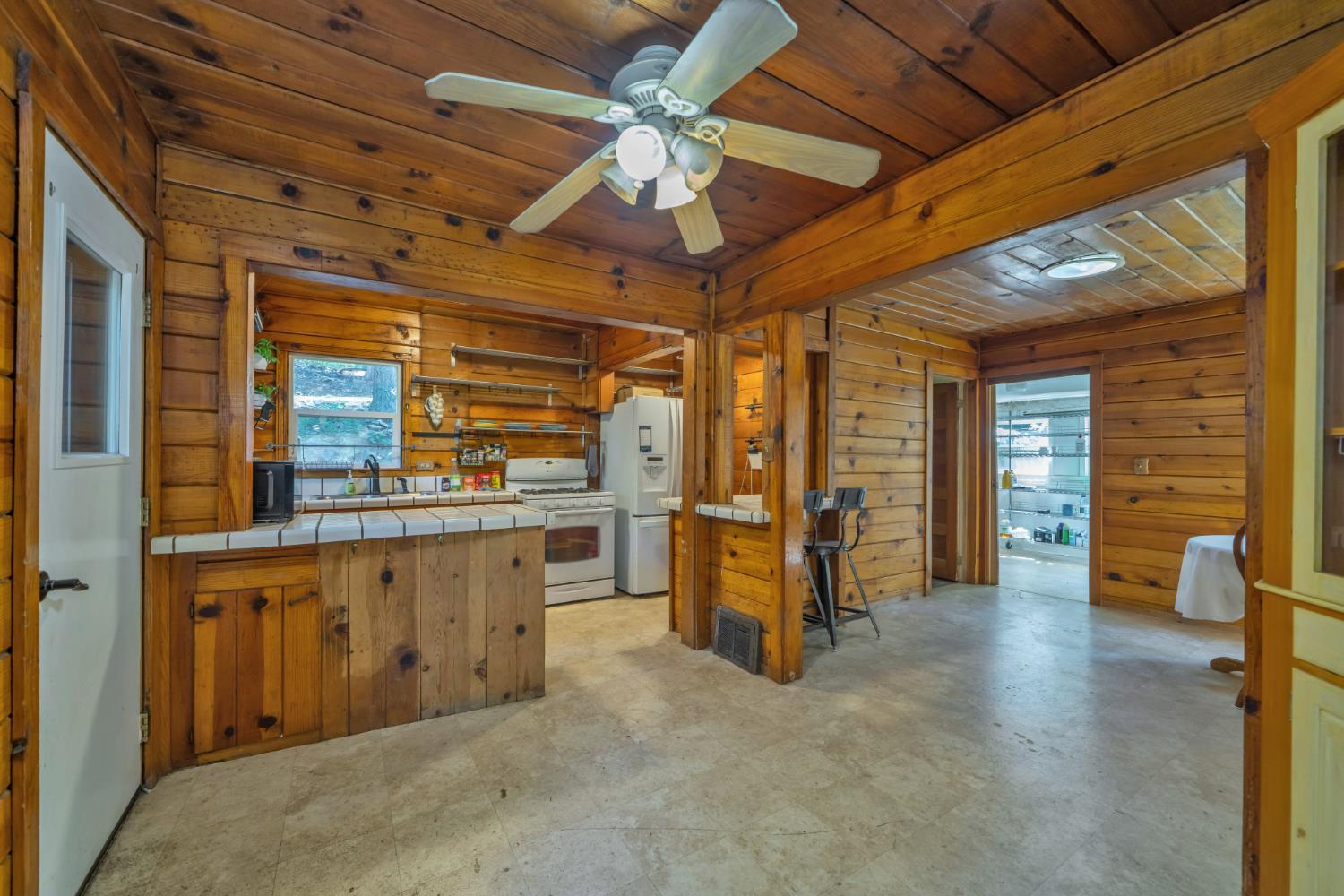 6929 Split Bend Road Pollock Pines, CA 95726 - Photo 7 of 38 a view of an empty room with a window