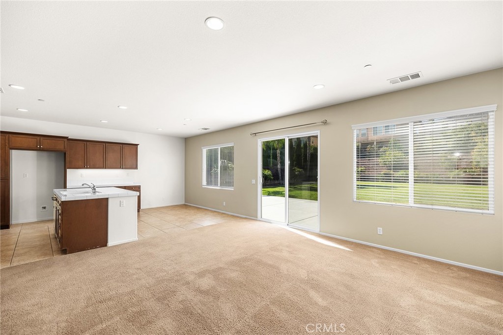 12047 Dewar Drive Riverside, CA 92505 - Photo 16 of 40 a view of an empty room with a window